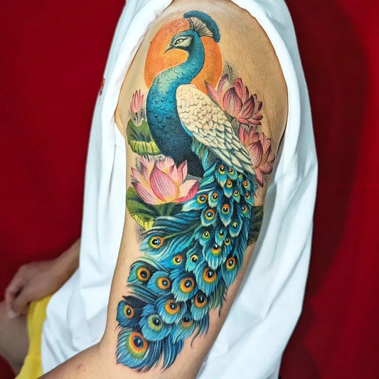 Big Realism Peacock Lotus Tattoo on Men Shoulder by @dragoncityink.danang
