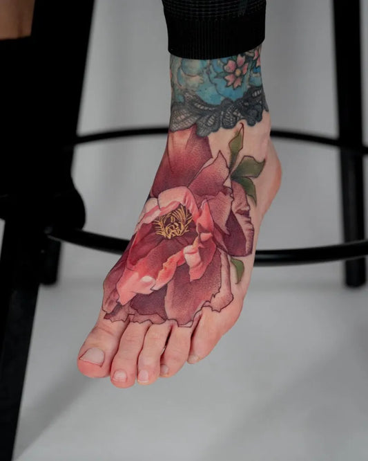 Big Realism Peony Tattoo on Women Foot by @monicasnyder_tattoos
