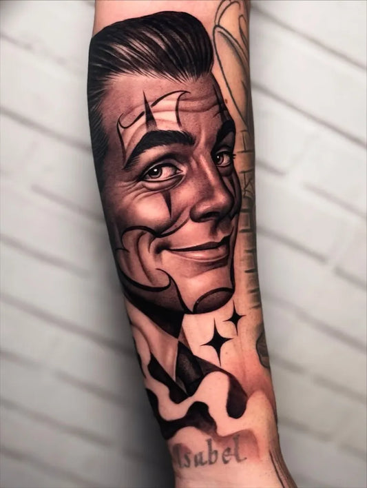 Big Realism Smiling Clown Face Tattoo on Men Arm by @pedroferrertattoo