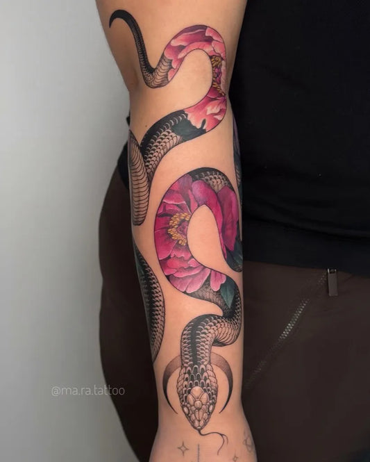 Big Realism Snake and Lotus on Women Arm Tattoo by @ma.ra.tattoo
