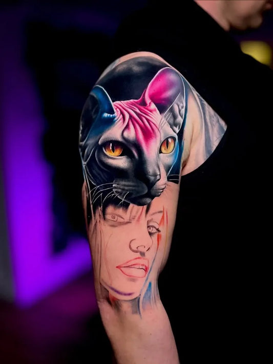 Big Realism Split Color Cat and Woman Face Tattoo on Men Upper Arm by @kohstyle