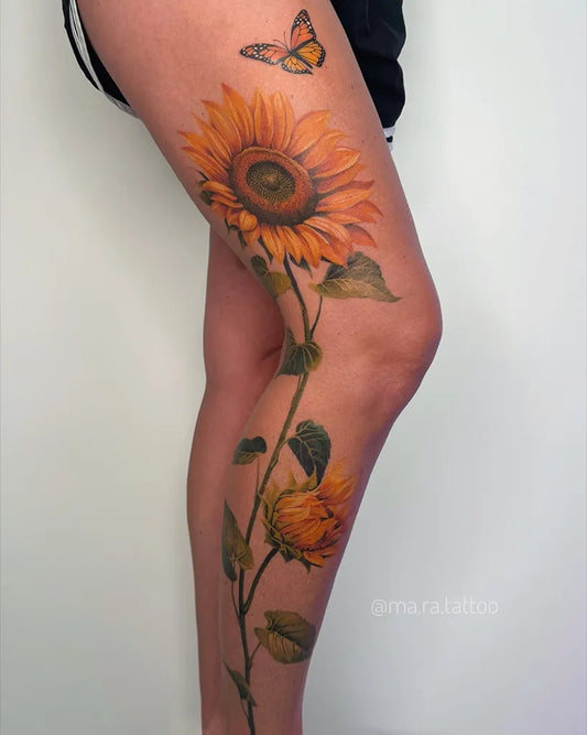 Big Realism Sunflower Butterfly on Women Thigh Tattoo by @ma.ra.tattoo