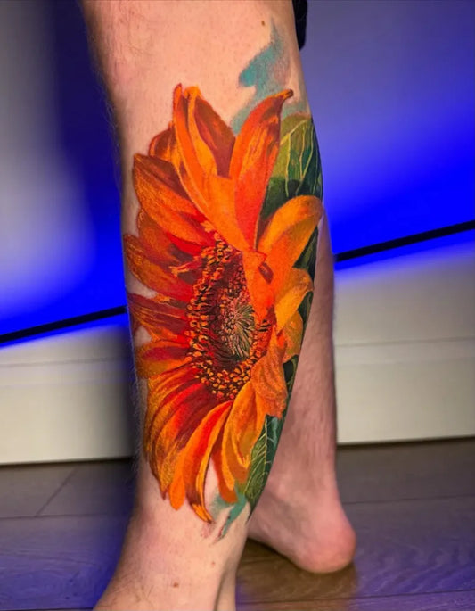 Big Realism Sunflower on Men Leg Tattoo by @tattoopaulina