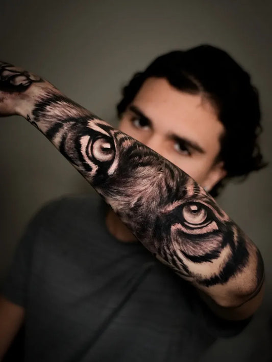 Big Realism Tiger Tattoo on Men Arm by @tattooheroes