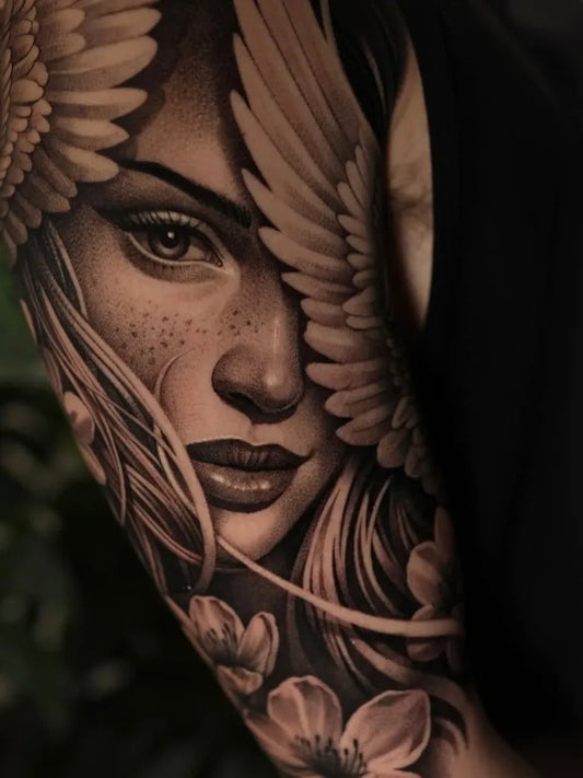 Big Realism Winged Woman with Flowers Tattoo on Women Arm by @hallkids_tattoo