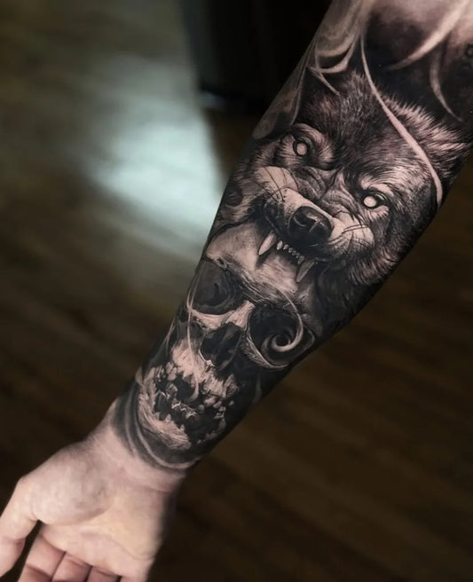 Big Realism Wolf and Skull Tattoo on Men Arm by @lamanigancetattootoronto