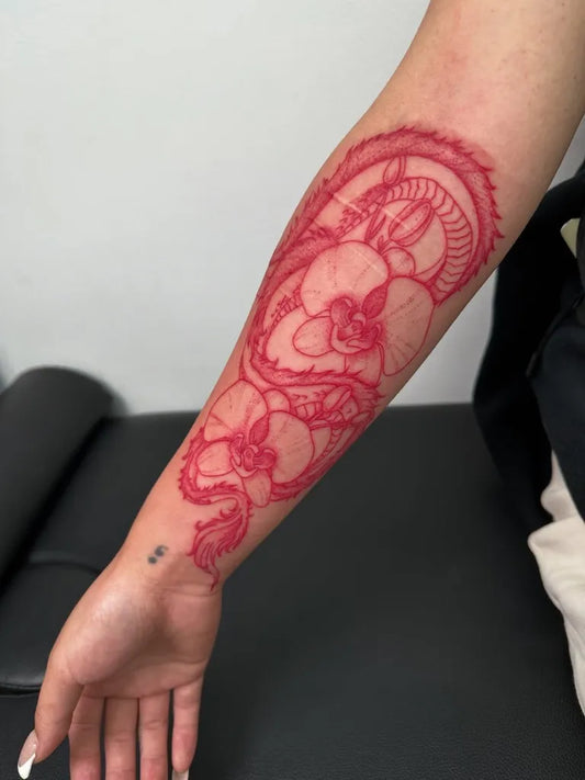 Big Red Dragon Tattoo on Women Forearm by @yungmonalisaofficial
