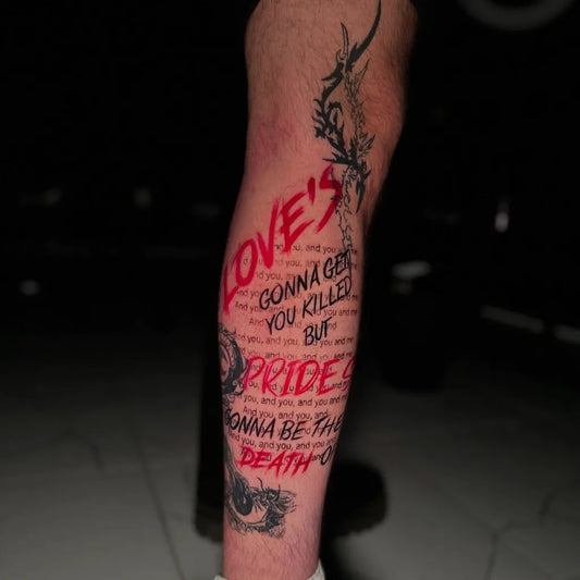 Big Red Text and Rose Thorns Tattoo on Men Leg by @studioatattoo