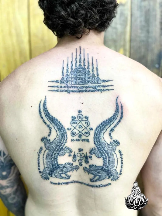 Big Sak Yant Haeha Yant with Twin Crocodiles Tattoo on Men Back by @bambootattoosamui
