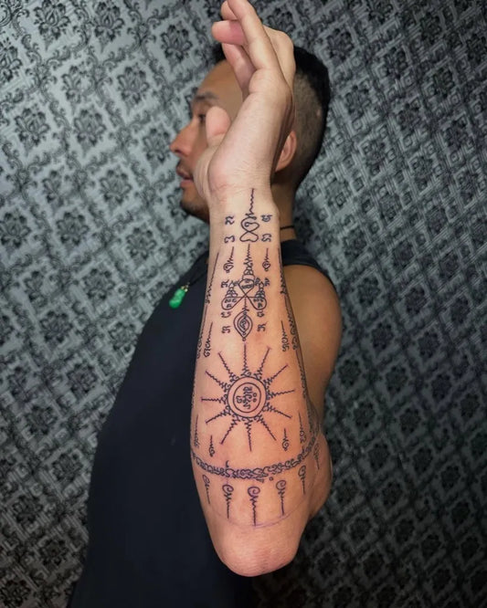 Big Sak Yant Hah Taew Tattoo on Men Forearm by @preservation_khmer_sak