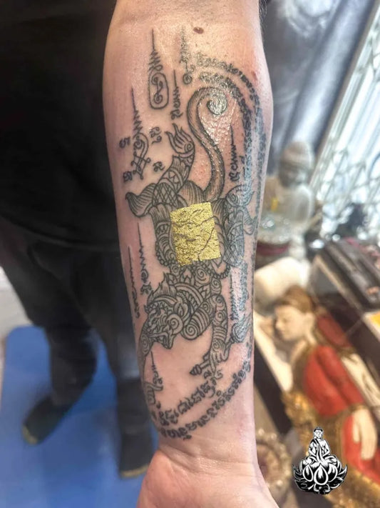 Big Sak Yant Hanak Hor Animal Women Arm by @bambootattoomaster