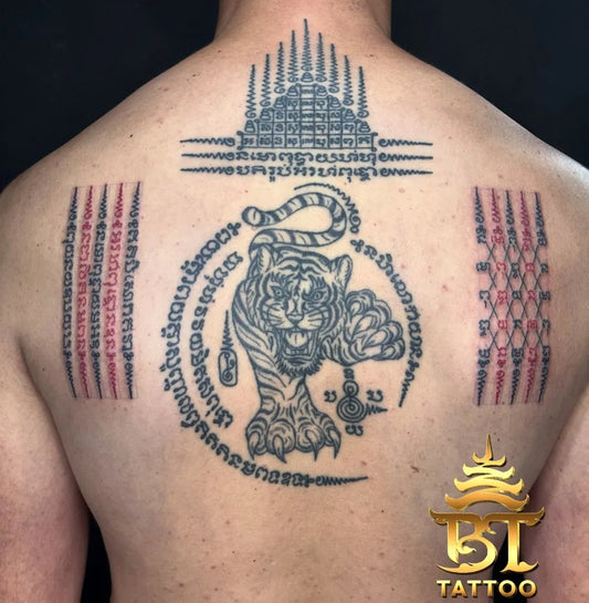 Big Sak Yant Tiger Temple Script Tattoo on Men Back by @bttattoobangkokthailand