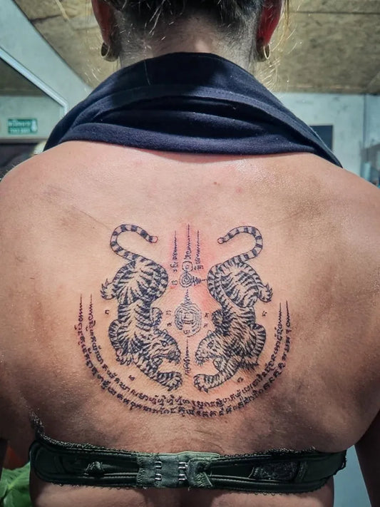 Big Sak Yant Twin Tigers with Yantra Tattoo on Women Back by @fightersinktattoorawai