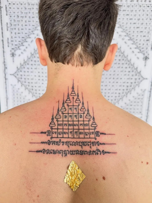 Big Sak Yant Yant Gaew Mon Tattoo on Men Back by @tahutattoo