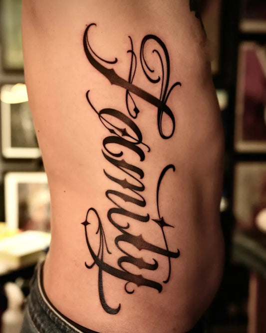 Big Script Family Tattoo on Men Rib by @jjjeff96_tattoo