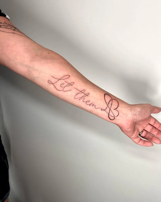Big Script Let Them Text Heart Symbol on Men Arm Tattoo by @chels_tatts