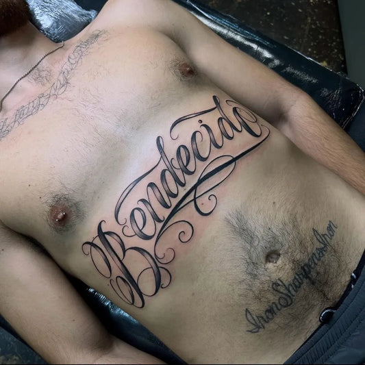 Big Script Word Tattoo on Men Stomach by @inkmindsetstudios