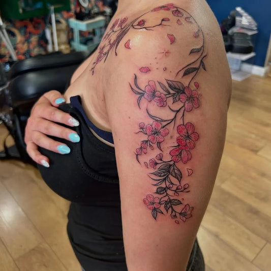 Big Traditional Cherry Blossom Branches on Women Shoulder Tattoo by @paganinkbysarahstreet