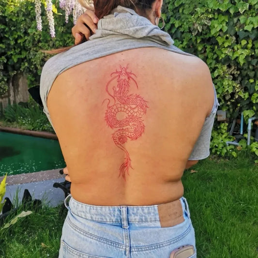Big Traditional Chinese Dragon on Women Back Tattoo by @nachotattoo_
