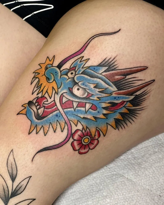 Big Traditional Dragon Flower on Women Thigh Tattoo by @jimjamtattoo