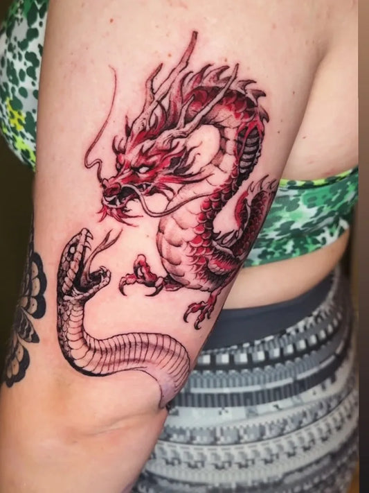 Big Traditional Dragon and Snake on Women Arm Tattoo by @tattooist_zebra
