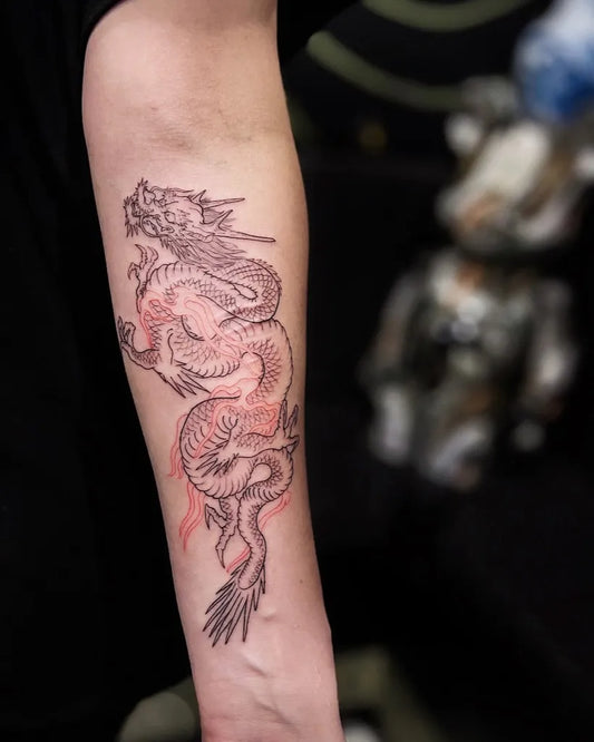 Big Traditional Dragon on Men Arm Tattoo by @blackblossomtattoos