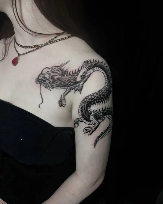Big Traditional Dragon on Women Shoulder Tattoo by @galenseewaldart