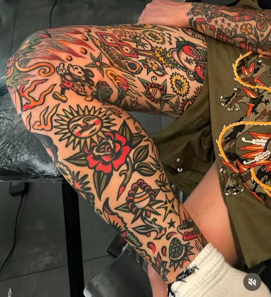 Big Traditional Flaming Sun Rose Tattoo on Men Thigh by @traditionaltattooink