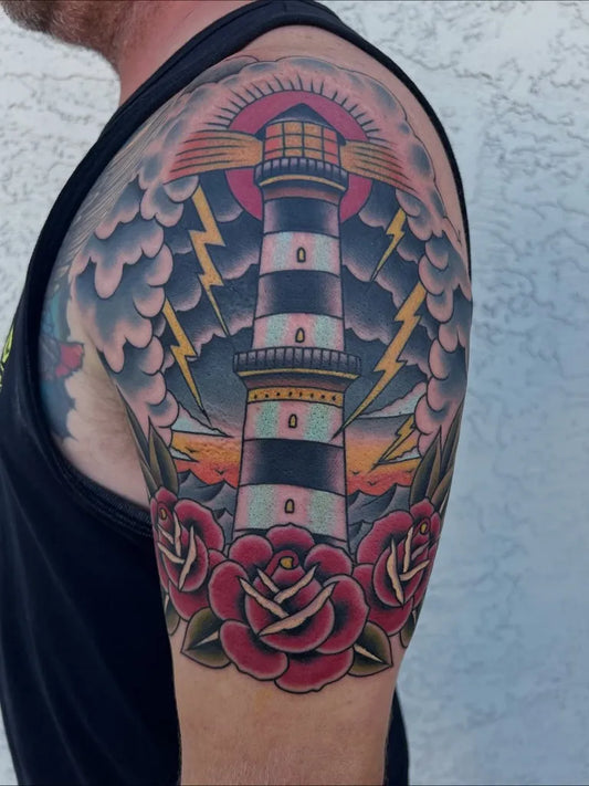 Big Traditional Lighthouse with Roses and Storm Tattoo on Men Shoulder by @hart_tat2