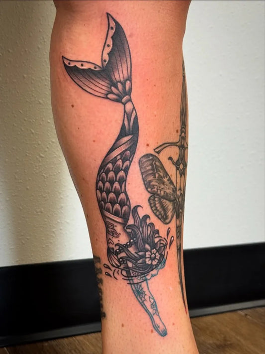 Big Traditional Mermaid Flower Sword Tattoo on Women Leg by @carmen_tattoos182