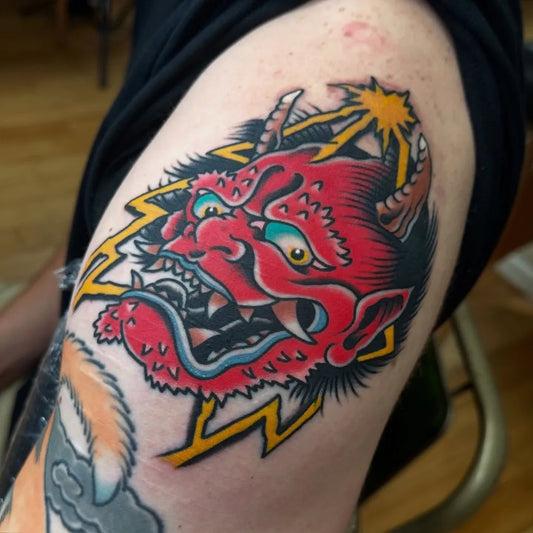 Big Traditional Oni Mask with Lightning on Men Arm Tattoo by @scuf_tattooer_
