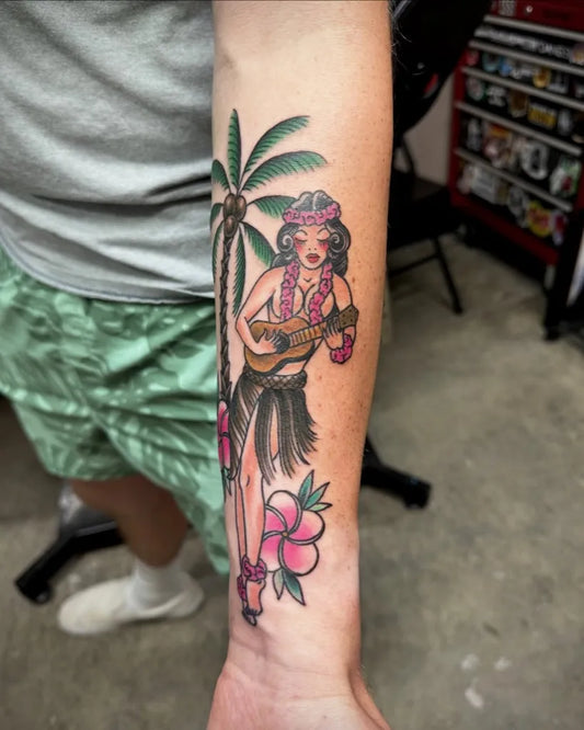 Big Traditional Pin Up Girl Hula Dancer with Palm Tree Tattoo on Men Arm by @piercingemporium