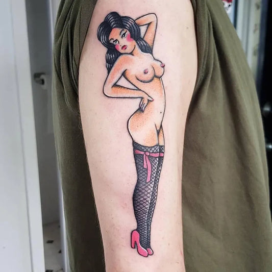 Big Traditional Pin Up Girl Tattoo on Men Arm by @inkstitution.brown