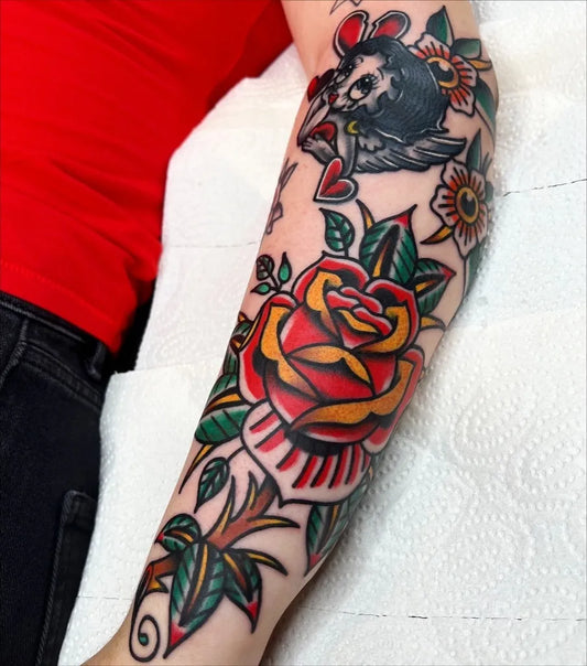 Big Traditional Rose and Crow on Women Arm Tattoo by @patrickdillinger