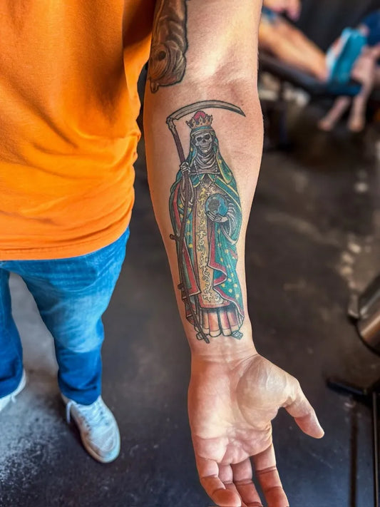 Big Traditional Santa Muerte with Scythe Tattoo on Men Arm by @studiothirteentattoos