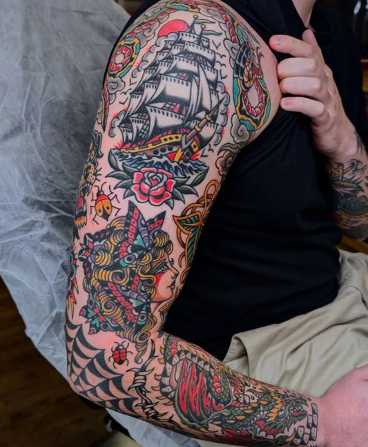 Big Traditional Ship Rose Dragon Tattoo on Men Arm by @traditionalkings