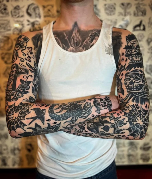 Big Traditional Skull Flower Dragon Tattoo on Men Arms by @traditionaltattooink