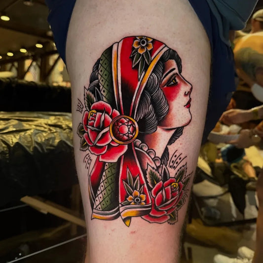 Big Traditional Woman with Headscarf and Roses Tattoo on Women Thigh by @tattoos.by.elin