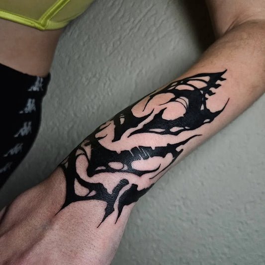 Big Tribal Abstract Spikes on Women Forearm Tattoo by @munik.darkttt