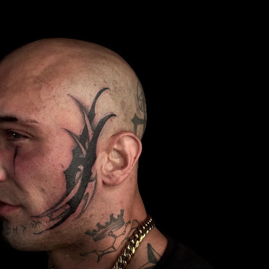 Big Tribal Antler Crown on Men Face Tattoo by @merix.officials