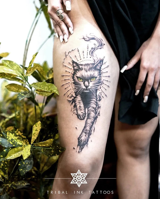 Big Tribal Black Cat with Sunburst on Women Thigh Tattoo by @tribalinktattoos