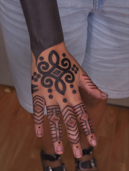 Big Tribal Geometric Patterns on Women Hand Tattoo by @lilentatt