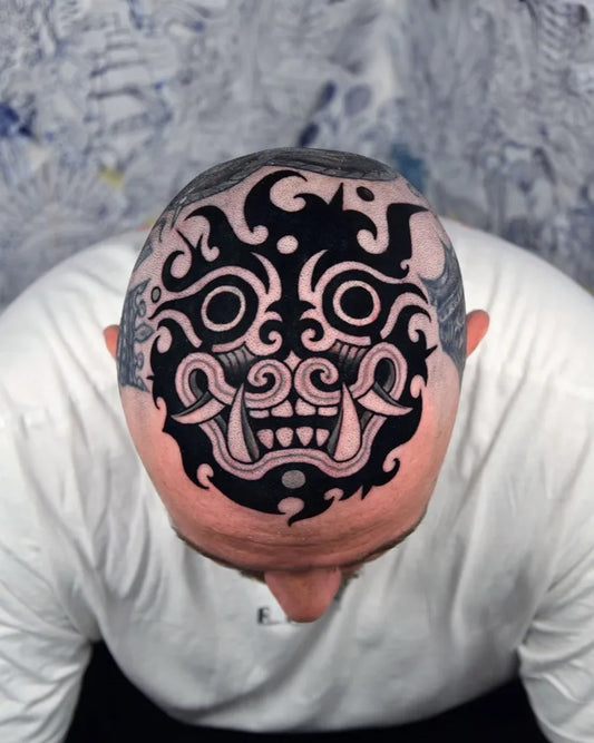 Big Tribal Hannya mask on Men Head Tattoo by @electric.smile.tattoo