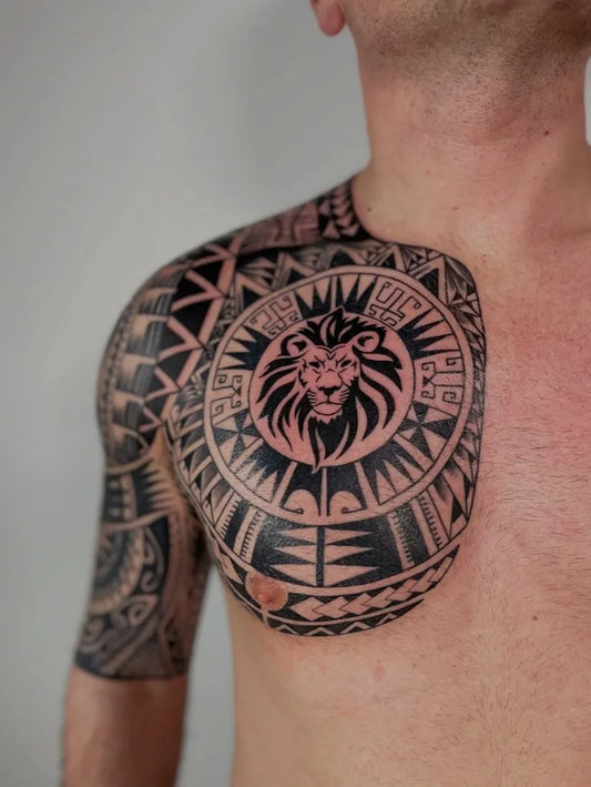Big Tribal Lion and Geometric Patterns on Men Shoulder Tattoo by @vikinkhamburg