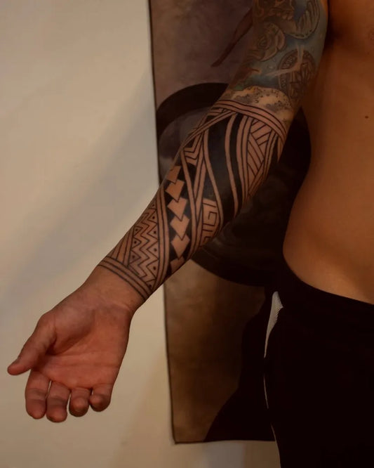 Big Tribal Polynesan pattern on Men Arm Tattoo by @nazca.tattoo