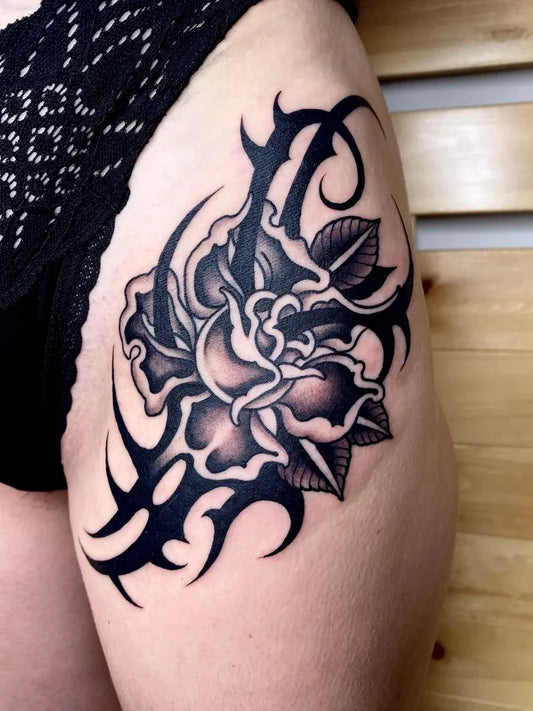Big Tribal Rose and Thorns on Women Thigh Tattoo by @stabhard