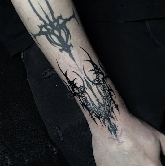 Big Tribal Spiked Cross on Men Arm Tattoo by @chemicall_tattoo