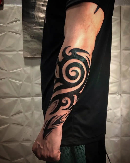 Big Tribal Spiral Vines on Men Arm Tattoo by @mdeztattoo