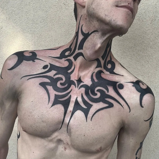 Big Tribal Swirls on Men Chest Tattoo by @princelet_tattoo