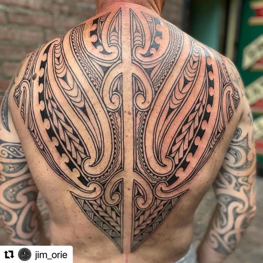Big Tribal Symmetrical motifs on Men Back Tattoo by @best_polynesian